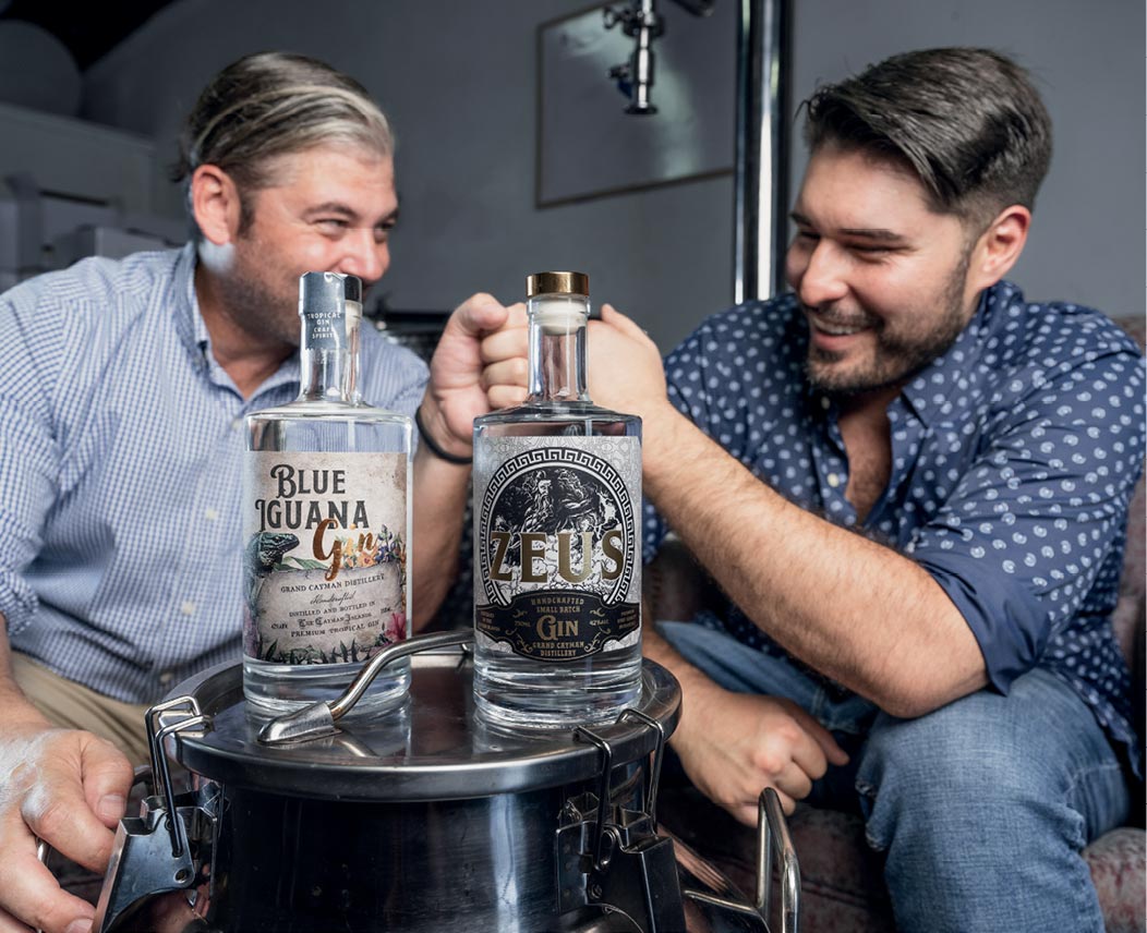 Grand Cayman Distillery sales representative Derek Mize, and CEO Moises Sevilla.